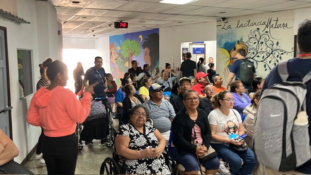 A hospital waiting room full of patients hoping for surgery